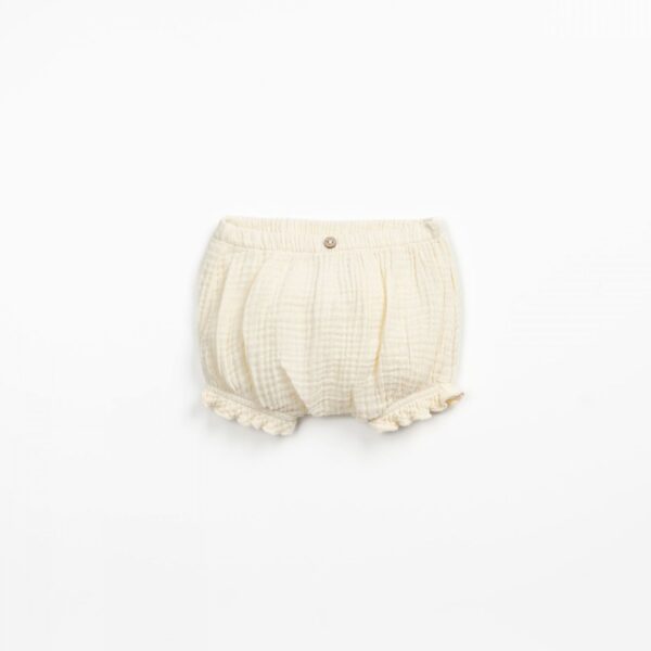 Cubrepañal con botón de coco de adorno | Textile Art | FIBER